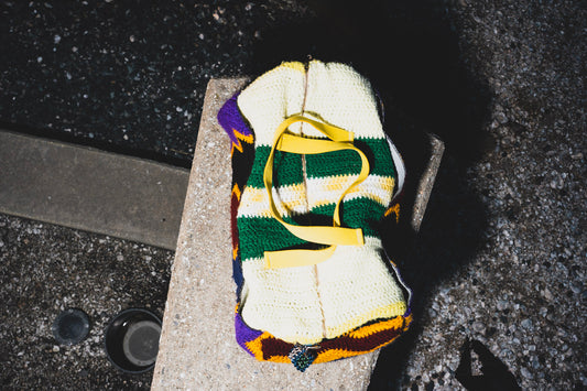 Crochet covered duffle bag