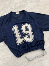 Load image into Gallery viewer, Cropped Dallas Cowboys Austin jersey size Medium.